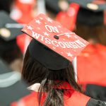 A graduate displays a decorated cap during UW-Madison's spring commencement ceremony for nearly 5,500 bachelor's degree candidates at Camp Randall Stadium at the University of Wisconsin-Madison on May 8, 2021