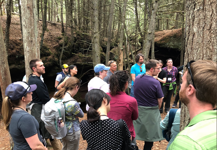 Group standing in the woods
