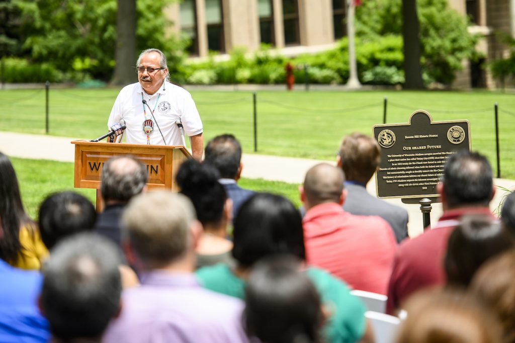 Man at podium in crowd