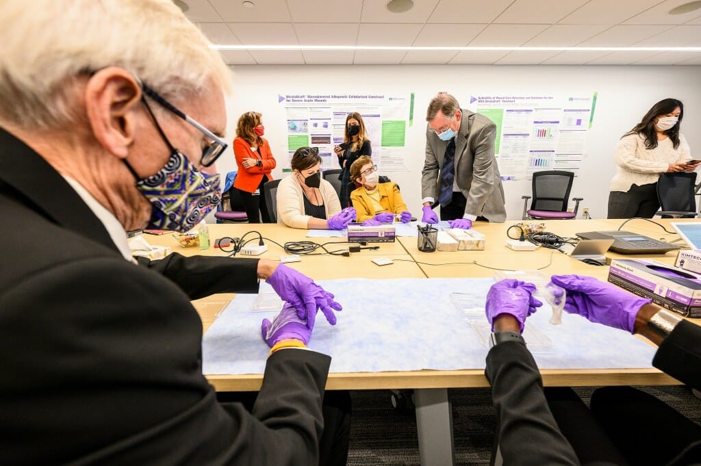 Gov. Evers, state leaders tour UW biotech spinoff Stratatech