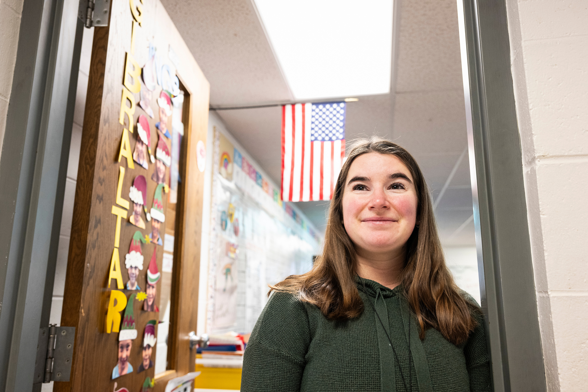 Teacher Mackenzie Straub, a 2021 graduate of the University of Wisconsin–Madison School of Education, teaches third-grade children in her classroom at Gibraltar Elementary School in Fish Creek, Wis., on Feb. 7, 2025. In 2018, Straub, a second-generation resident of Door County, was among the first few UW–Madison students to receive Bucky's Tuition Promise. At the time, the newly launched UW–Madison program pledged to cover four years of tuition and segregated fees for any incoming freshman from Wisconsin whose family's annual household adjusted gross income was $56,000 or less.